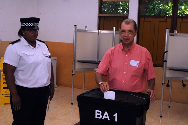 Incumbent President James Michel casts ballot in Seychelles' historic run-off presidential election