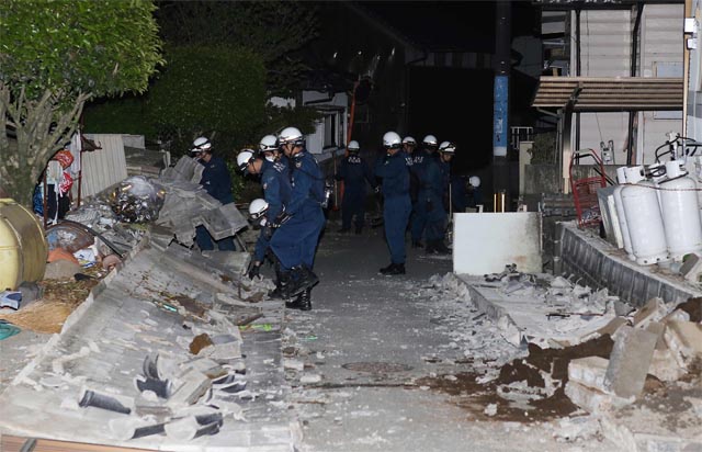 Rescuers scramble for survivors after deadly quake hits Japan