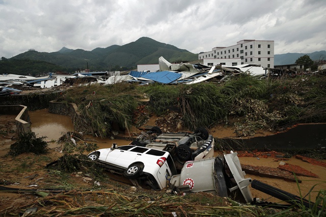 Tropical storm kills six in China, eight missing