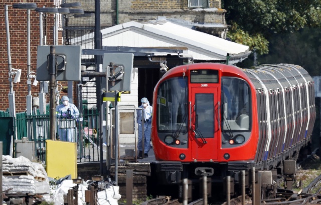 Manhunt for London bomber as threat level raised