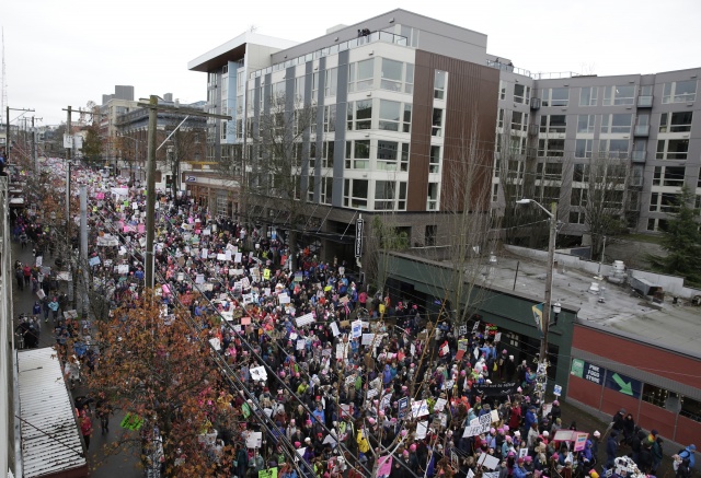 Trump inauguration anniversary marred by shutdown, protests