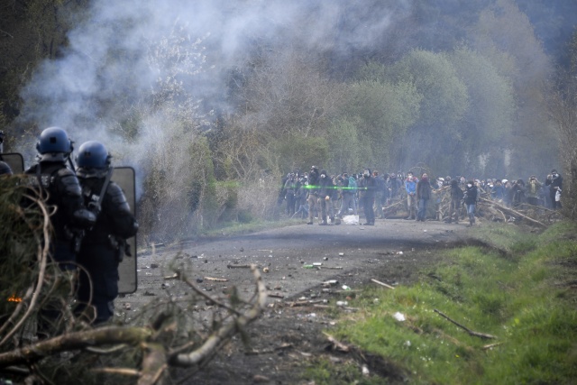 Macron faces mass protests as opponents join forces