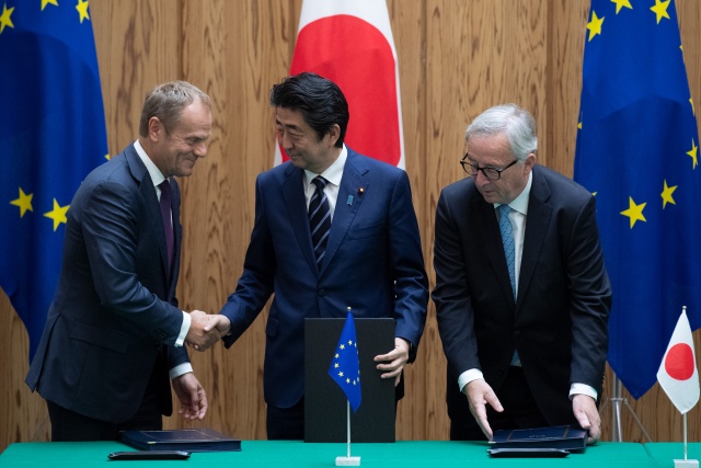 Europe, Japan sign massive free trade deal