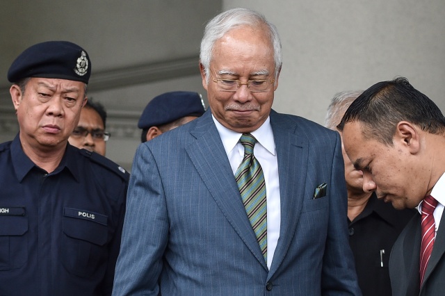 Malaysia ex-PM faces 21 new charges over 1MDB scandal
