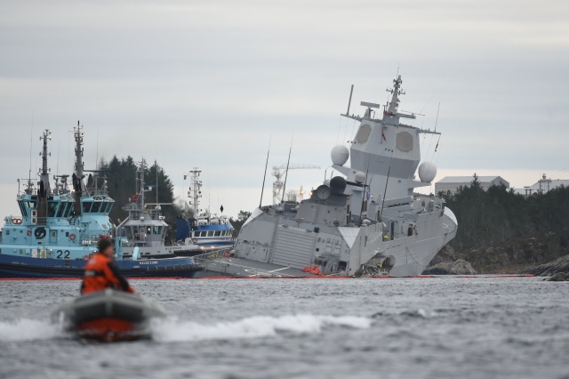 Race to stop Norway frigate sinking after oil tanker collision