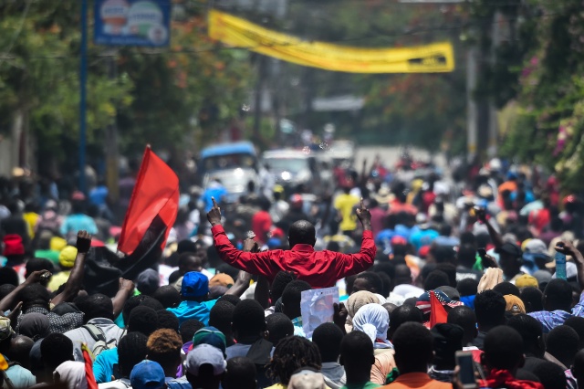 Thousands march in Port-au-Prince to demand president's resignation