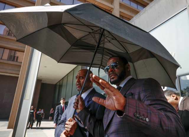 R. Kelly arrested on child pornography, other charges