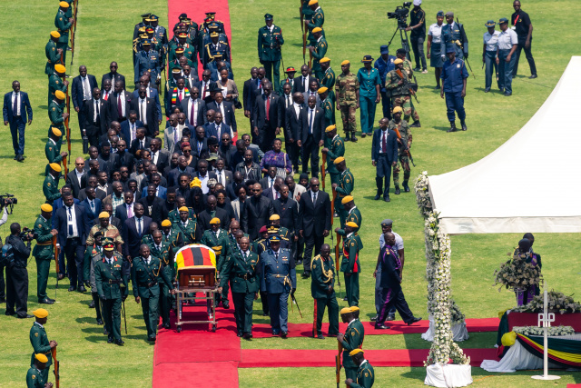 African leaders laud Mugabe at state funeral in divided Zimbabwe