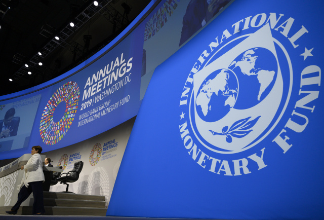 IMF members put off voting change; agree to boost lending capacity