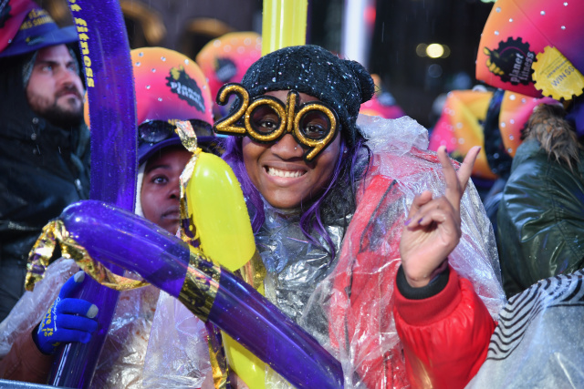 New Year fireworks, smoke and tear gas as decade begins with a bang