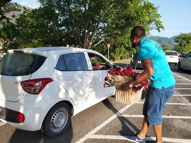 A Valentine's Day rose give-away in the streets of Seychelles spreads love, cheer