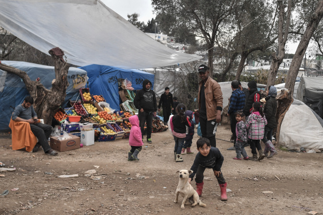 Refugee shelter burns as Greece rolls out new asylum restrictions