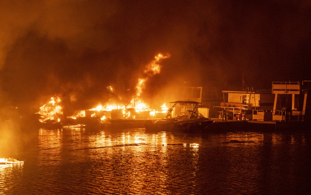 California fires force thousands to flee as more blazes feared