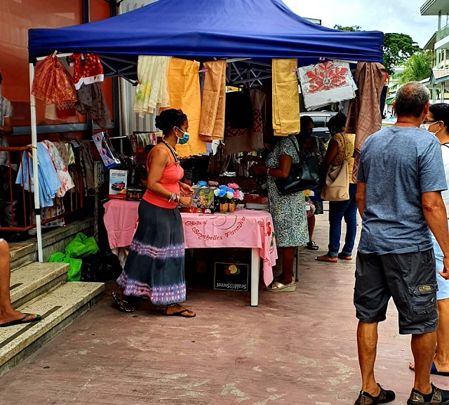 Shoppers flock to Seychelles' capital for last-minute gifts, but feel squeezed by rupee's devaluation