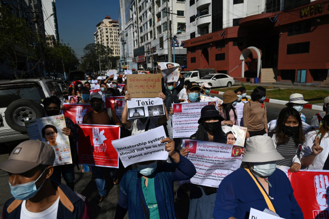 Myanmar anti-coup protesters march again as US sanctions generals