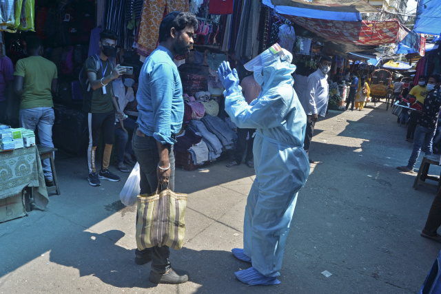 India hospitals overwhelmed by virus as Japan declares emergency