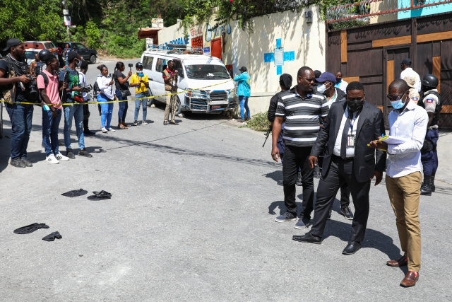 Haiti police hunt down president's assassins as uncertainty grows