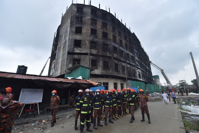 Bangladesh factory owner held after fire kills 52