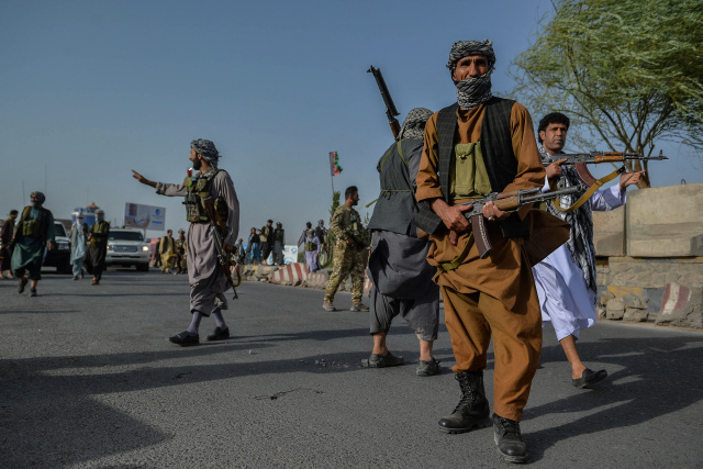 Afghan fighting rages as US and UK accuse Taliban of massacring civilians