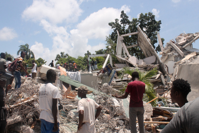 Death toll in massive Haiti quake jumps to over 1,200