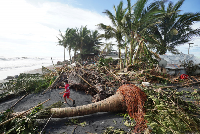 Tens of thousands flee as super typhoon hits the Philippines