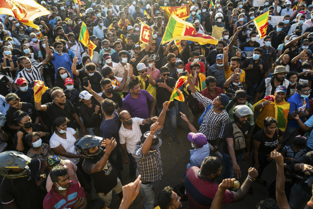 Crisis-hit Sri Lanka halts share trading as protests spiral