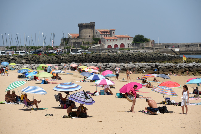 Europe swelters in record-breaking June heatwave