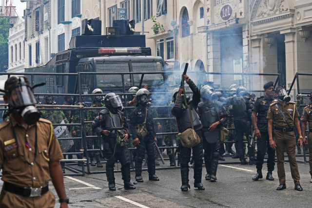 Protesters storm Sri Lanka PM's office after President flees abroad