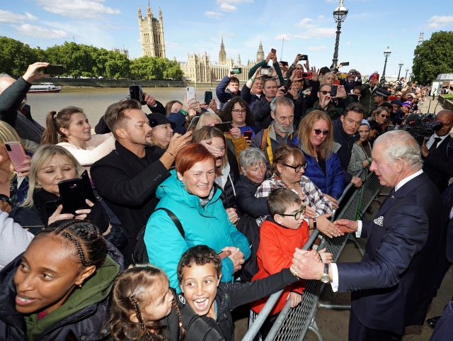 King Charles surprises huge London queue for queen's coffin