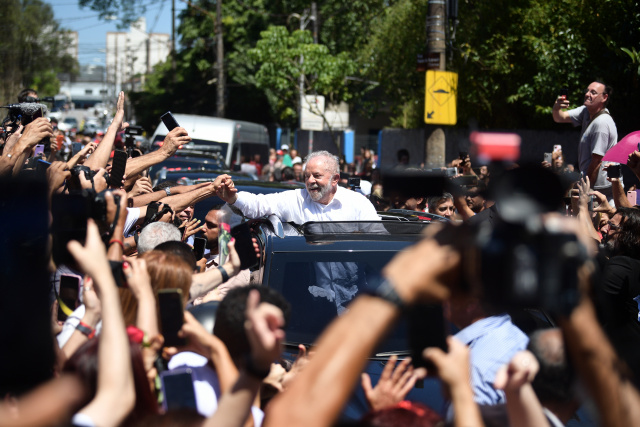 Lula wins Brazil's bitter presidential vote, Bolsonaro silent