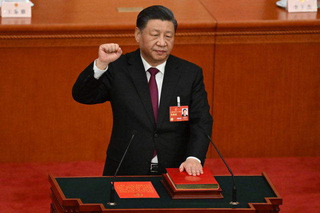 China's Xi handed historic third term as president