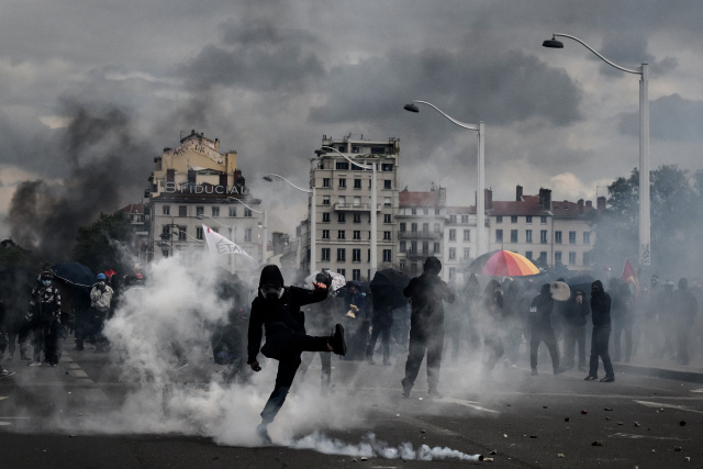 Clashes erupt at French May Day protests against Macron