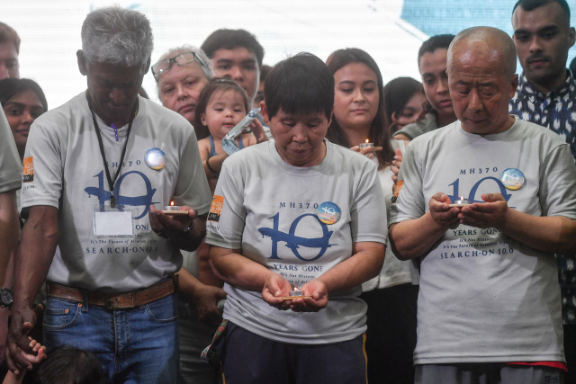 Relatives of Malaysia plane crash victims mark 10 years since disappearance