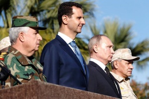 On Mideast trip, Putin orders partial withdrawal from Syria