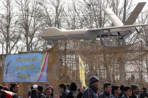 Iran says downed US drone recovered in its territorial waters