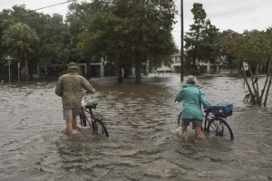 Barry weakens, but US officials warn of heavy rains, floods, tornadoes