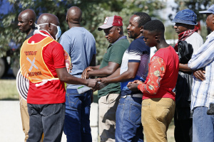 World leaders to hold crisis talks as virus toll tops 21,000