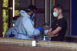 Spain calls on army to fight virus as WHO signals slowdown